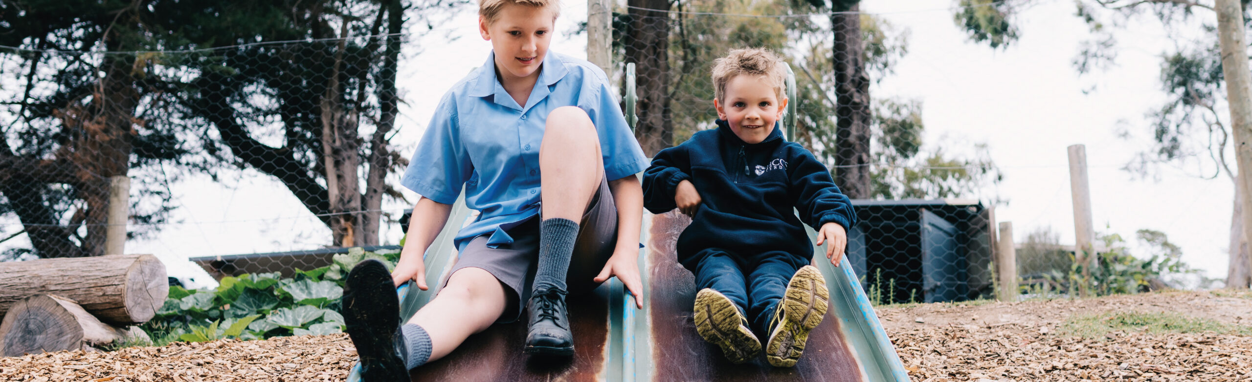 boys on slide 1800 x 550 pxl-01-01
